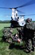 Image: Marines tend to a simulated injured pilot during a Tactical Recovery of Aircraft and Personnel.